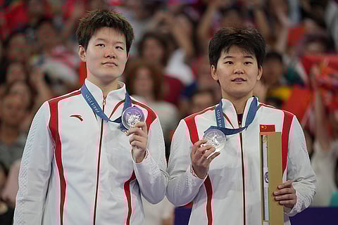 Badminton Women's doubles: China's Liu Shengshu and Tan Ning after winning silver medal